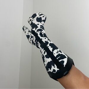 La moda cow print platform boots